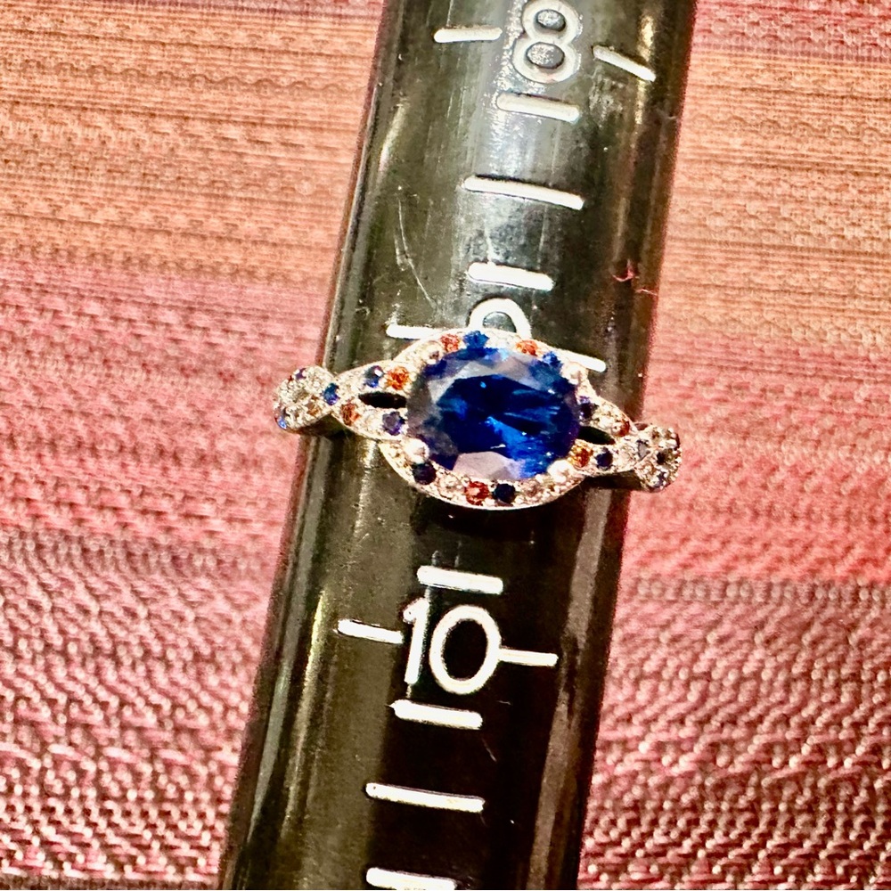 Fragrant Jewels Silver Ring Blue Gem with Surrounding Red, White, and Blue Gems